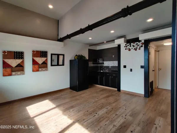 a view of a glass door and the balcony