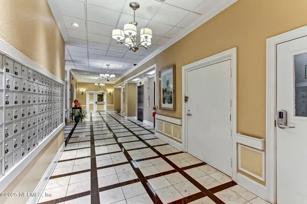 a bathroom with a window and a shower