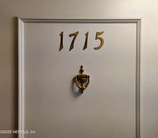 a view of hallway with wooden floor