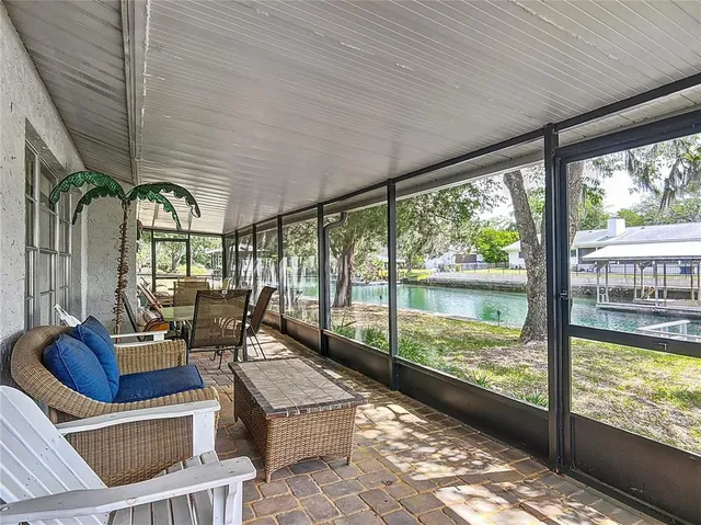 a view of a large window with chairs