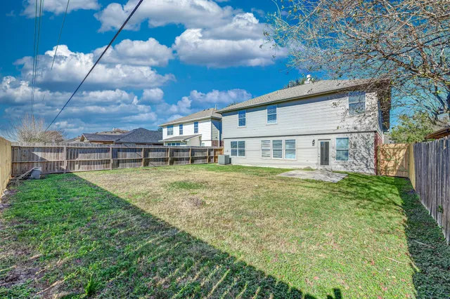 a house view with a garden space
