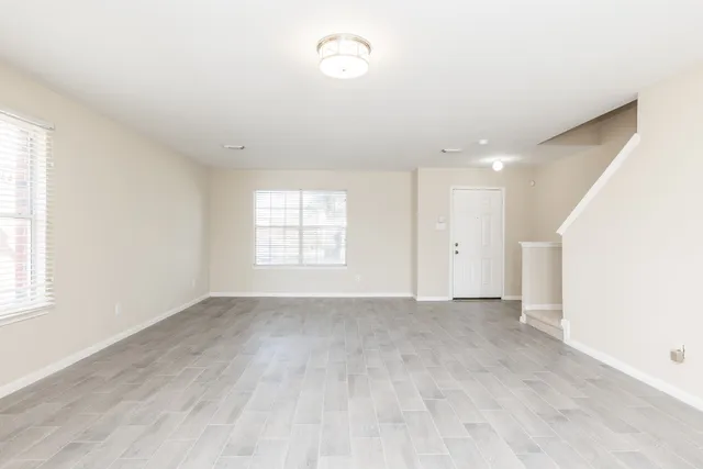 an empty room with windows