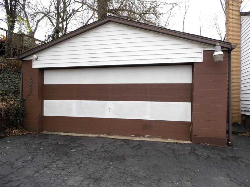 Parking Lot/Garage. FANTASTIC TWO CAR GARAGE PROVIDES LOADS OF STORAGE IN LOWER LEVEL OF RESIDENCE.