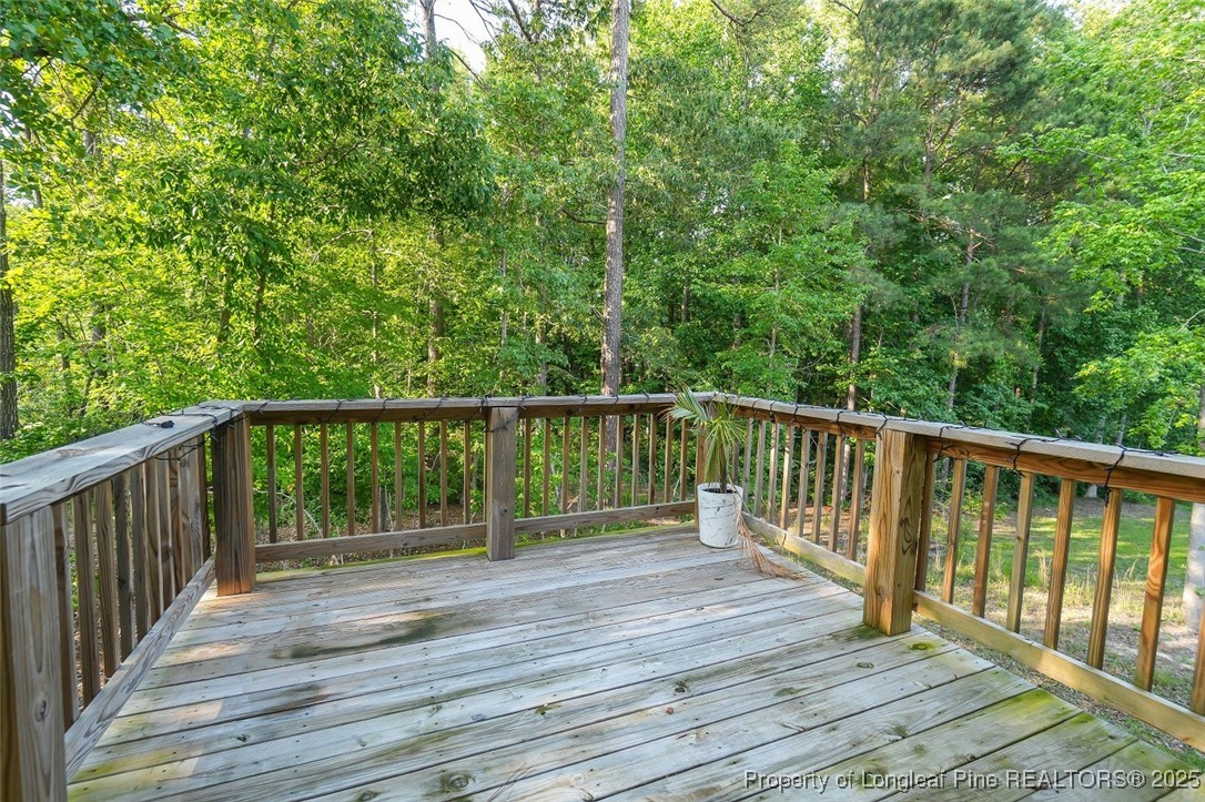 29 York Court Spring Lake, NC 28390 - Photo 22 of 22 a view of balcony with wooden floor