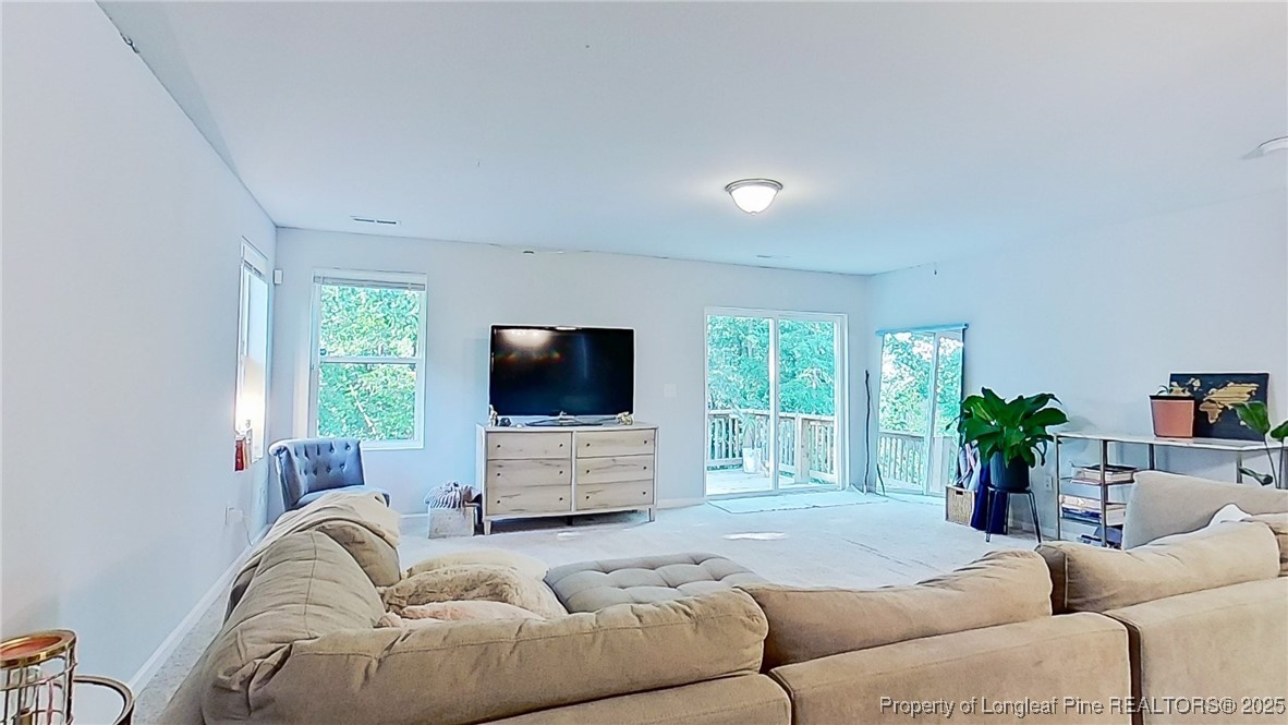 29 York Court Spring Lake, NC 28390 - Photo 4 of 22 a living room with furniture and a flat screen tv