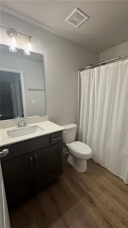 a bathroom with a sink and a toilet