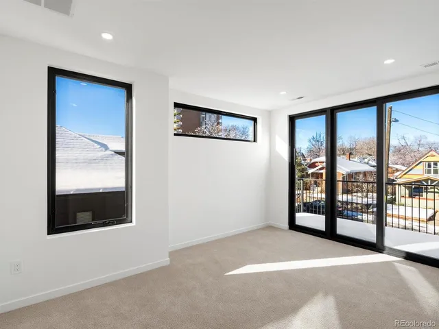 an empty room with sliding door