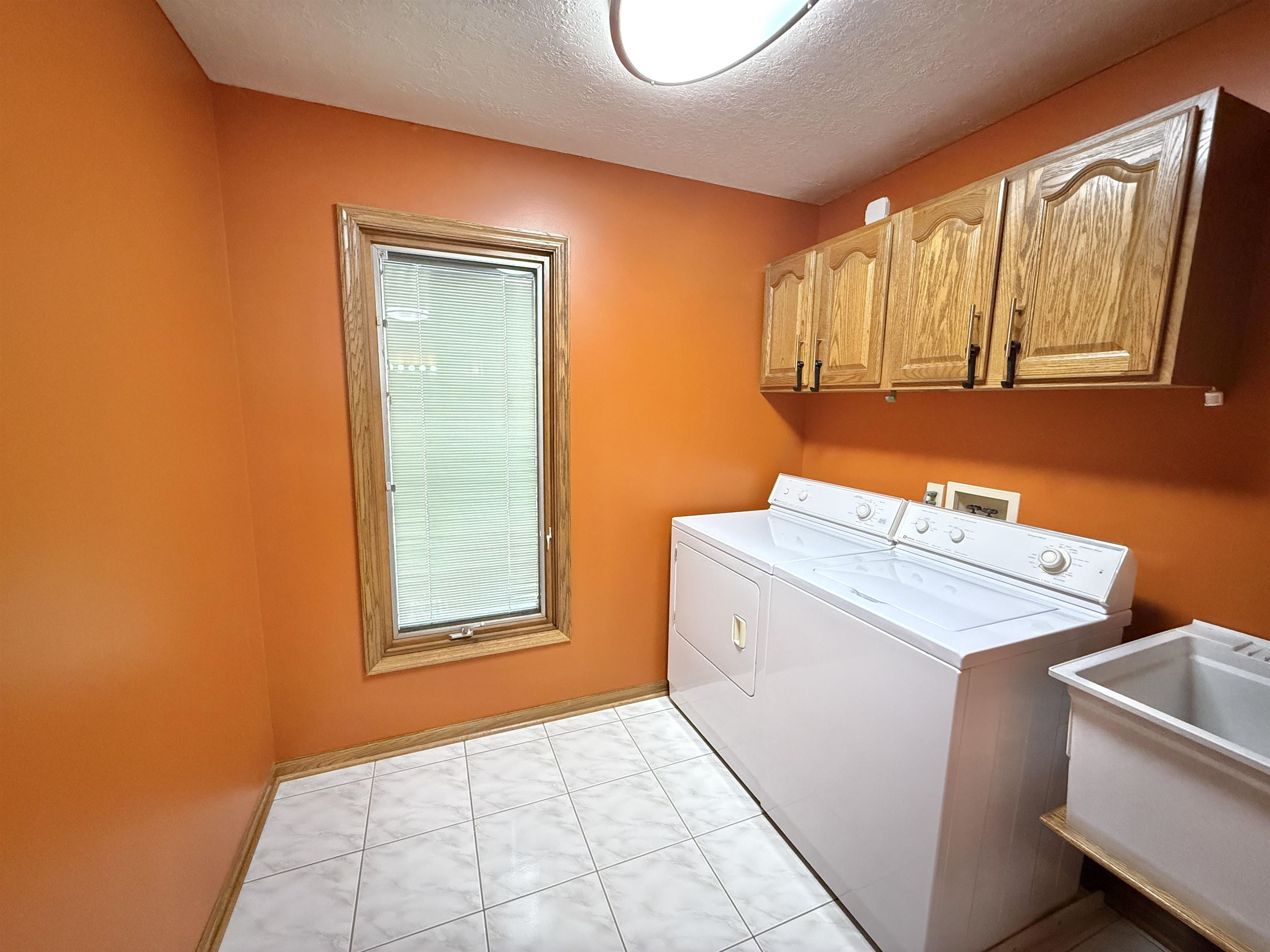5449 South Branch Court Rochelle, IL 61068 - Photo 18 of 45 a utility room with dryer and washer