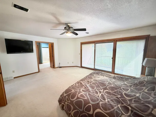 a view of a livingroom with a flat screen tv