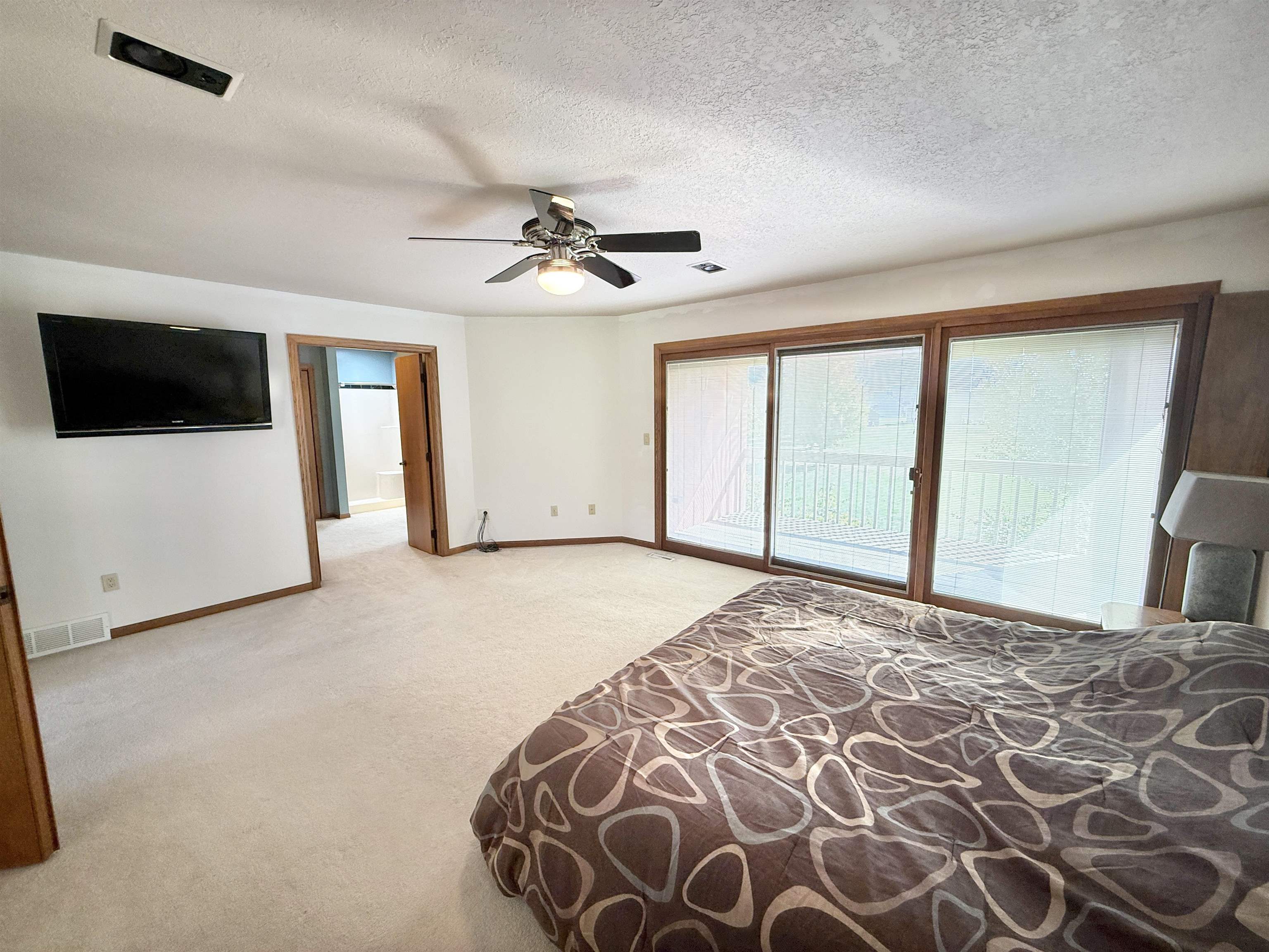 5449 South Branch Court Rochelle, IL 61068 - Photo 23 of 45 a view of a livingroom with a flat screen tv
