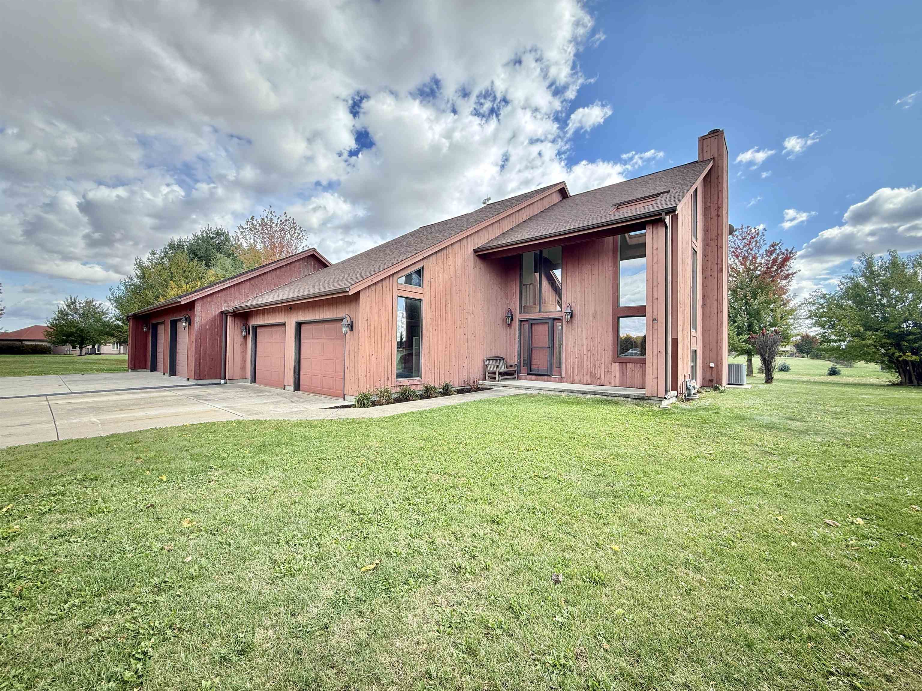 5449 South Branch Court Rochelle, IL 61068 - Photo 3 of 45 a view of a house with backyard and garden