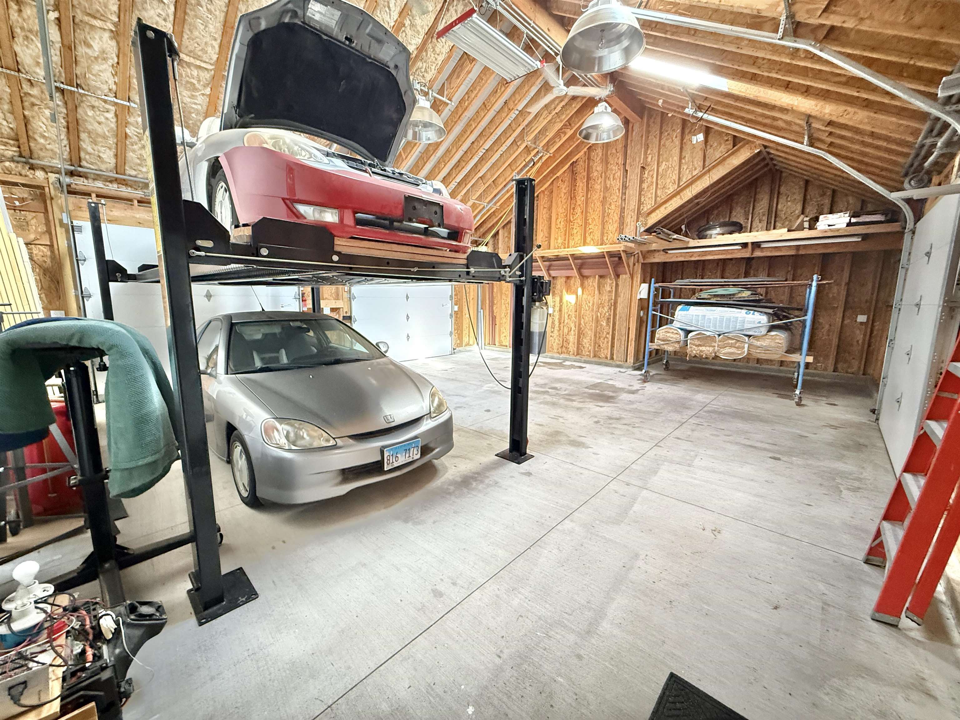 5449 South Branch Court Rochelle, IL 61068 - Photo 36 of 45 a car parked in garage