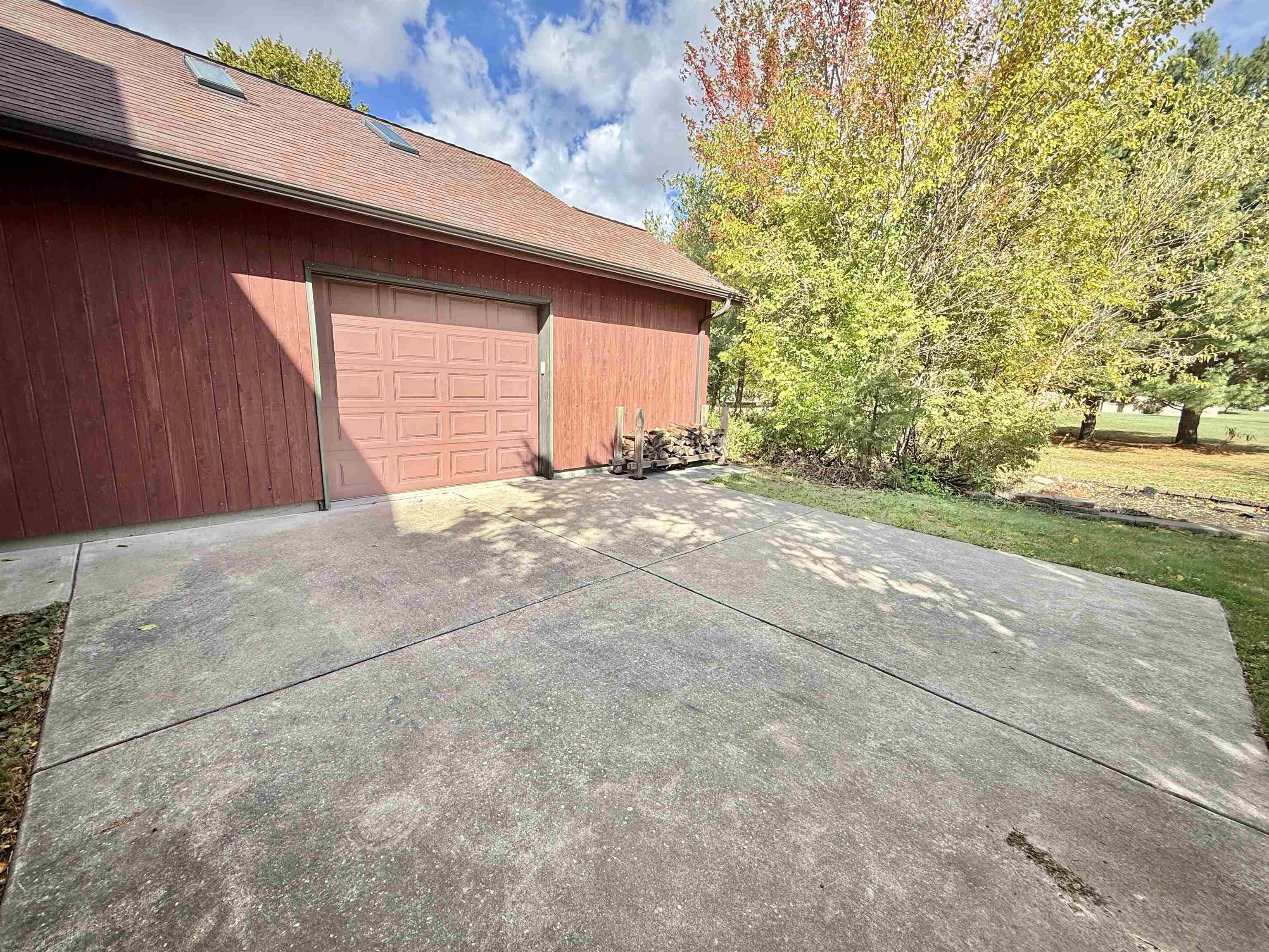 5449 South Branch Court Rochelle, IL 61068 - Photo 38 of 45 a view of a house with a yard and garage