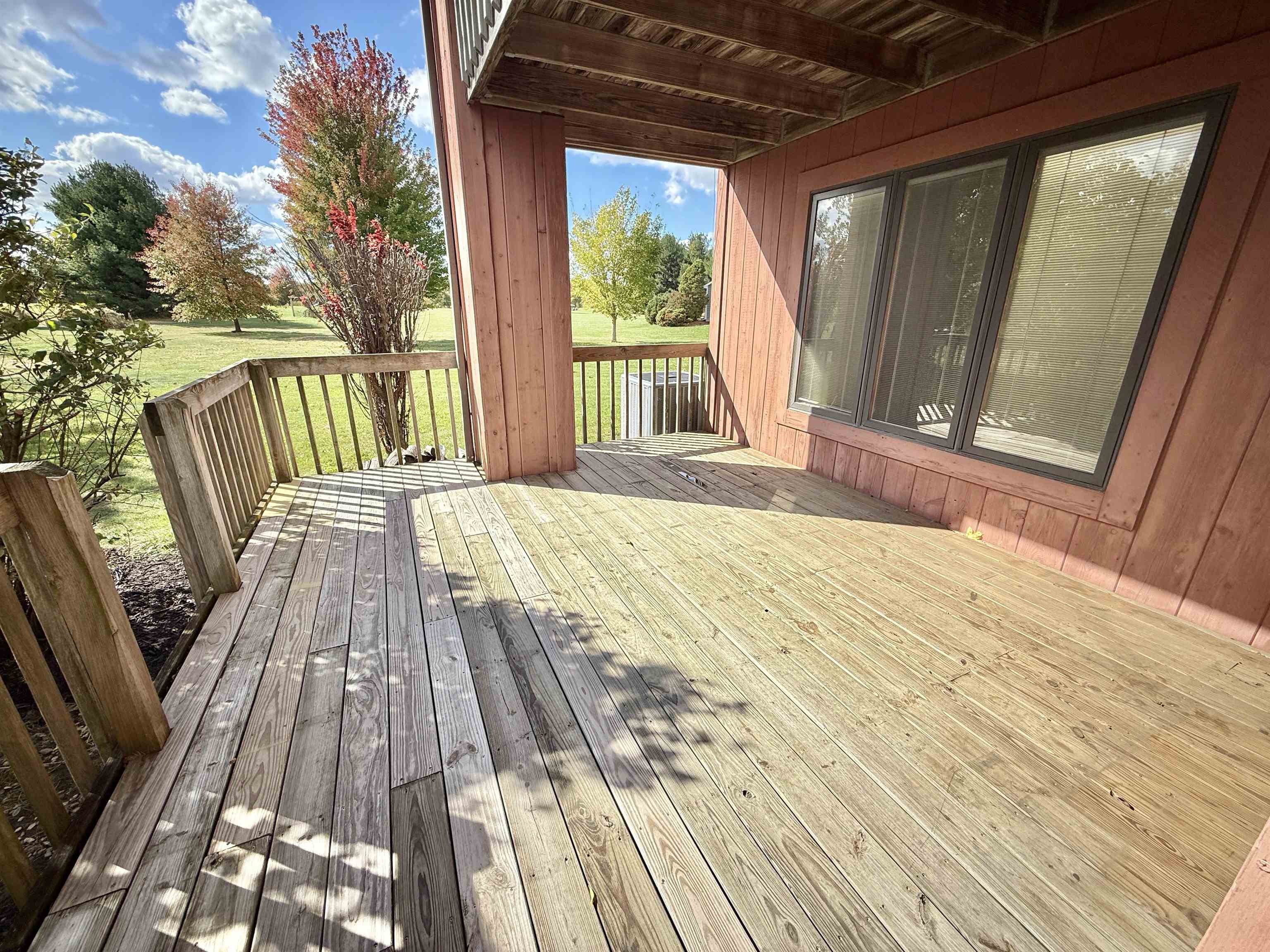 5449 South Branch Court Rochelle, IL 61068 - Photo 43 of 45 a view of balcony with wooden floor