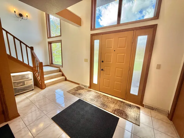 a view of a kitchen with an entryway