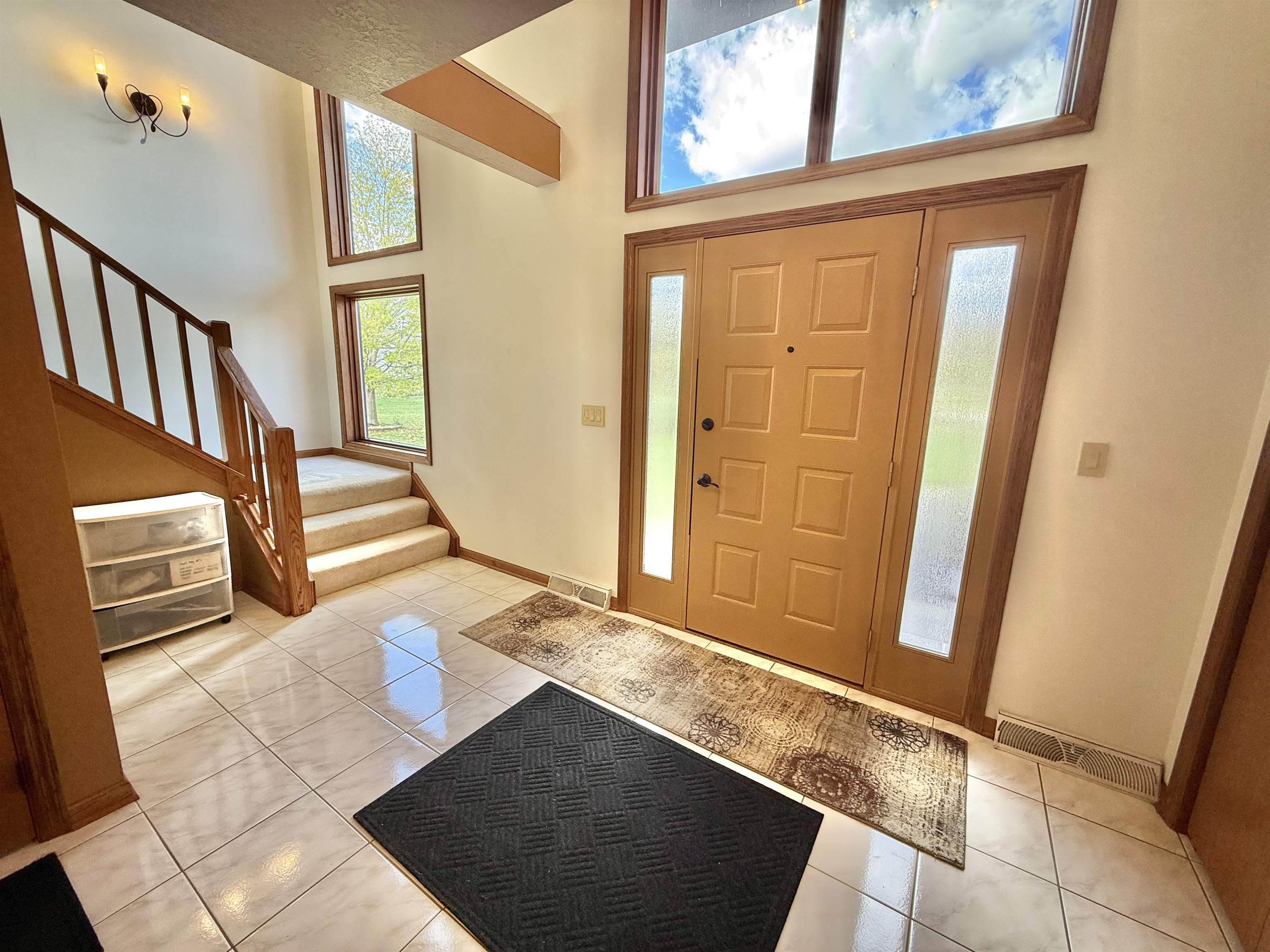 5449 South Branch Court Rochelle, IL 61068 - Photo 5 of 45 a view of a kitchen with an entryway