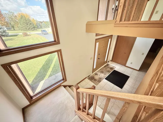 a view of balcony with furniture