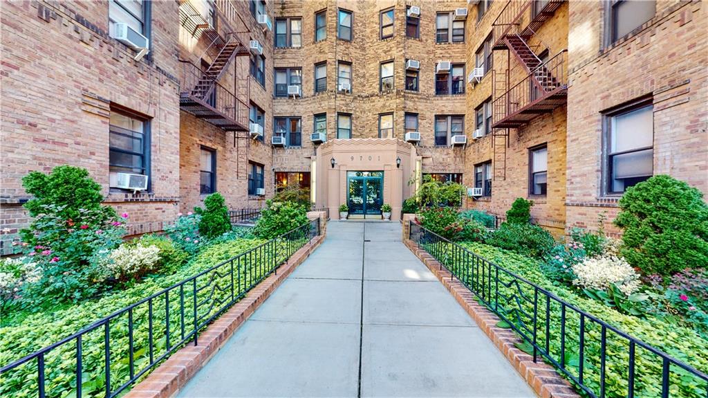 9701 Shore Road, Unit 1N Brooklyn, NY 11209 - Photo 15 of 18 a view of a brick building next to a building