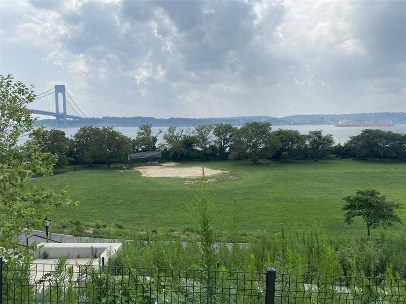 9701 Shore Road, Unit 1N Brooklyn, NY 11209 - Photo 17 of 18 a view of a grassy field