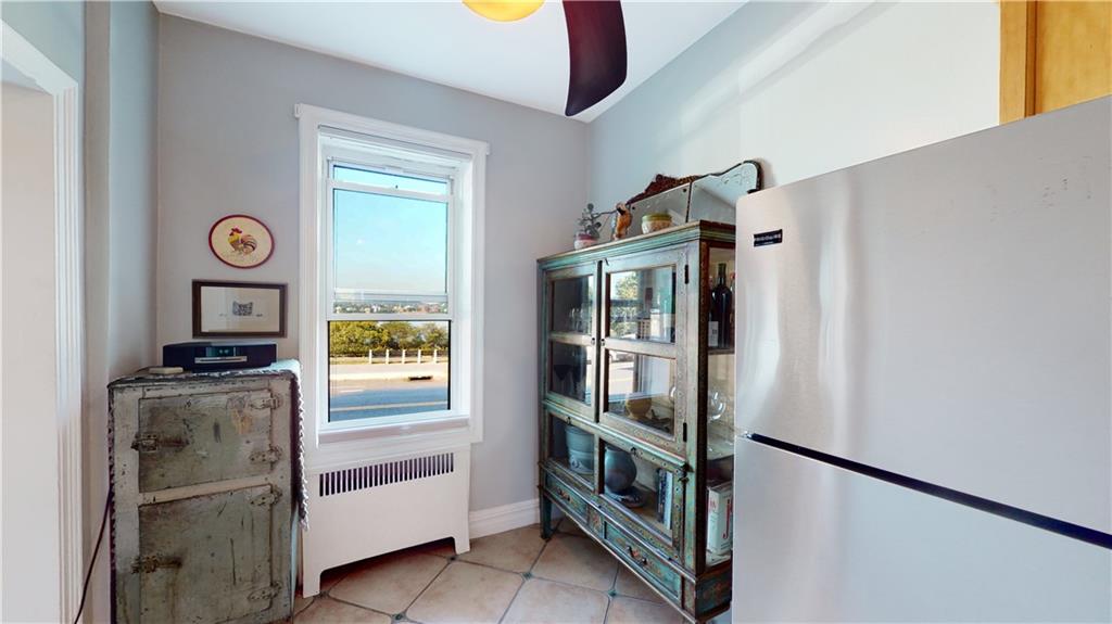 9701 Shore Road, Unit 1N Brooklyn, NY 11209 - Photo 6 of 18 a utility room with dryer and washer