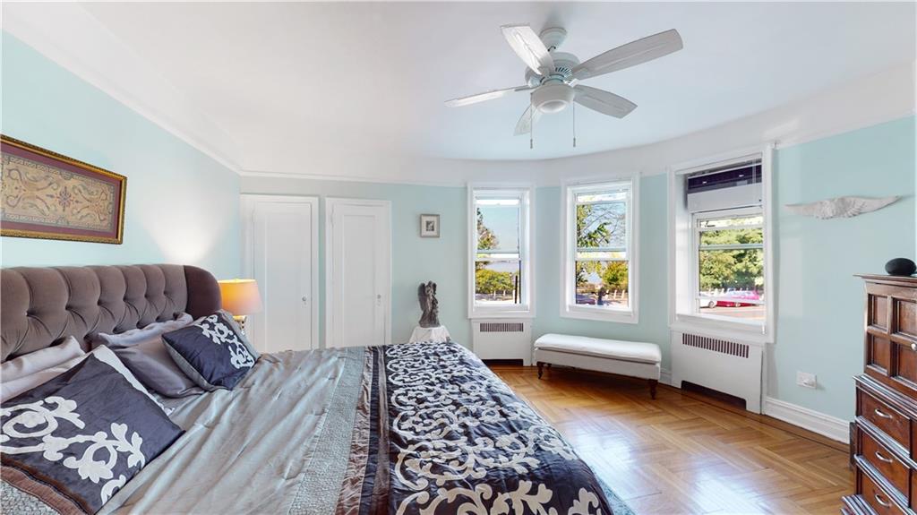 9701 Shore Road, Unit 1N Brooklyn, NY 11209 - Photo 7 of 18 a bedroom with furniture and a window