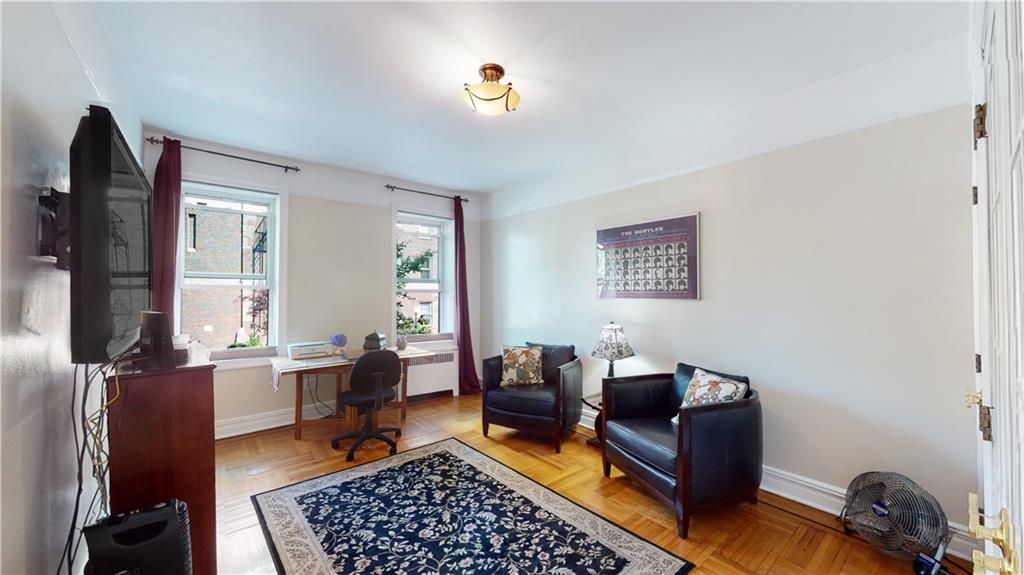 9701 Shore Road, Unit 1N Brooklyn, NY 11209 - Photo 9 of 18 a living room with furniture rug and window