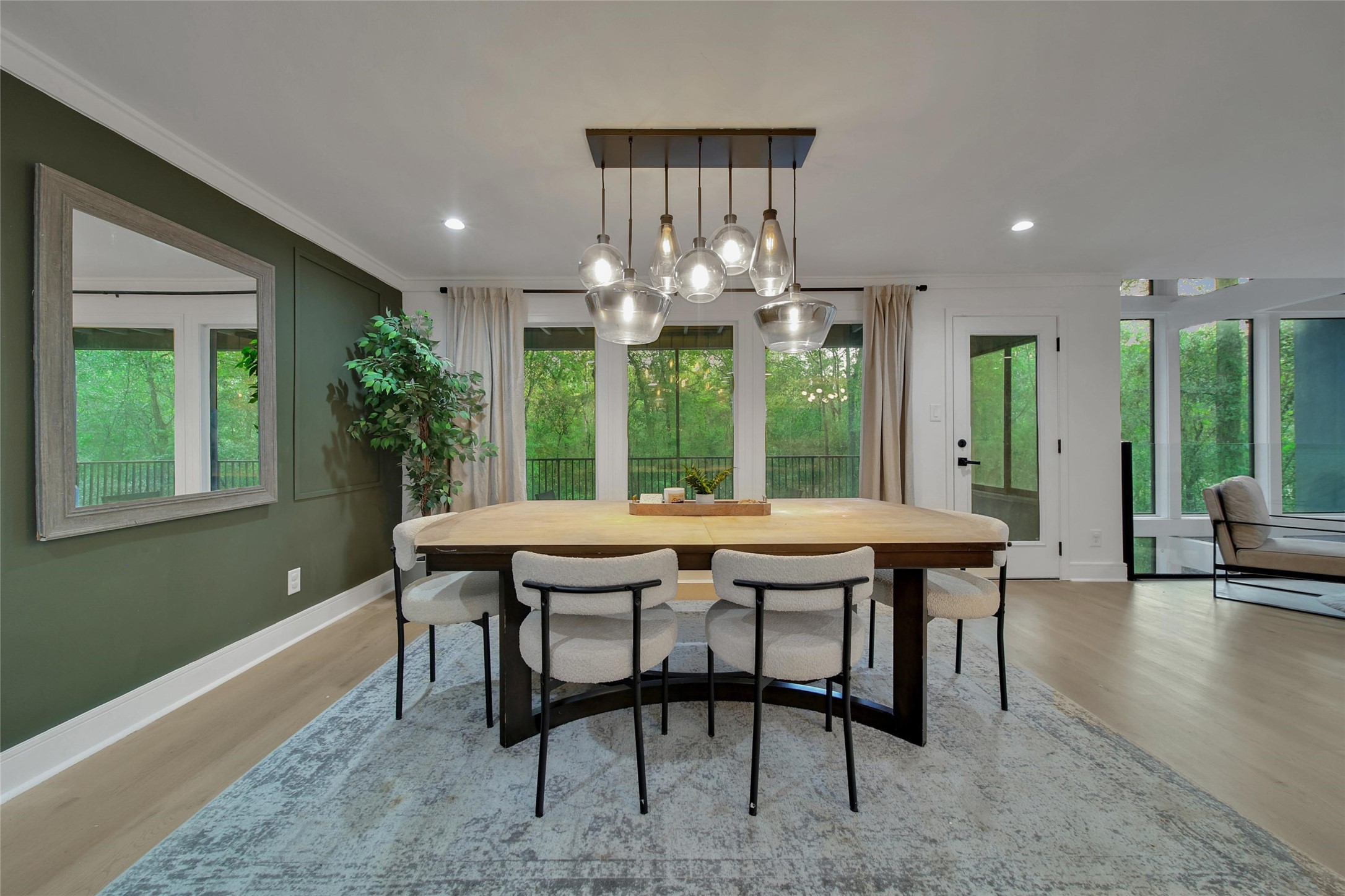 140 South Timber Top Drive Spring, TX 77380 - Photo 19 of 38 a dining room with a wooden table and chairs