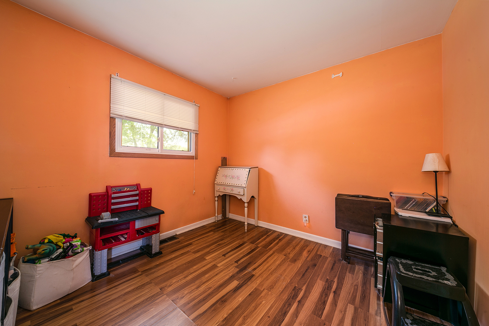 192 South Pinecrest Road Bolingbrook, IL 60440 - Photo 12 of 21 a room with furniture and wooden floor