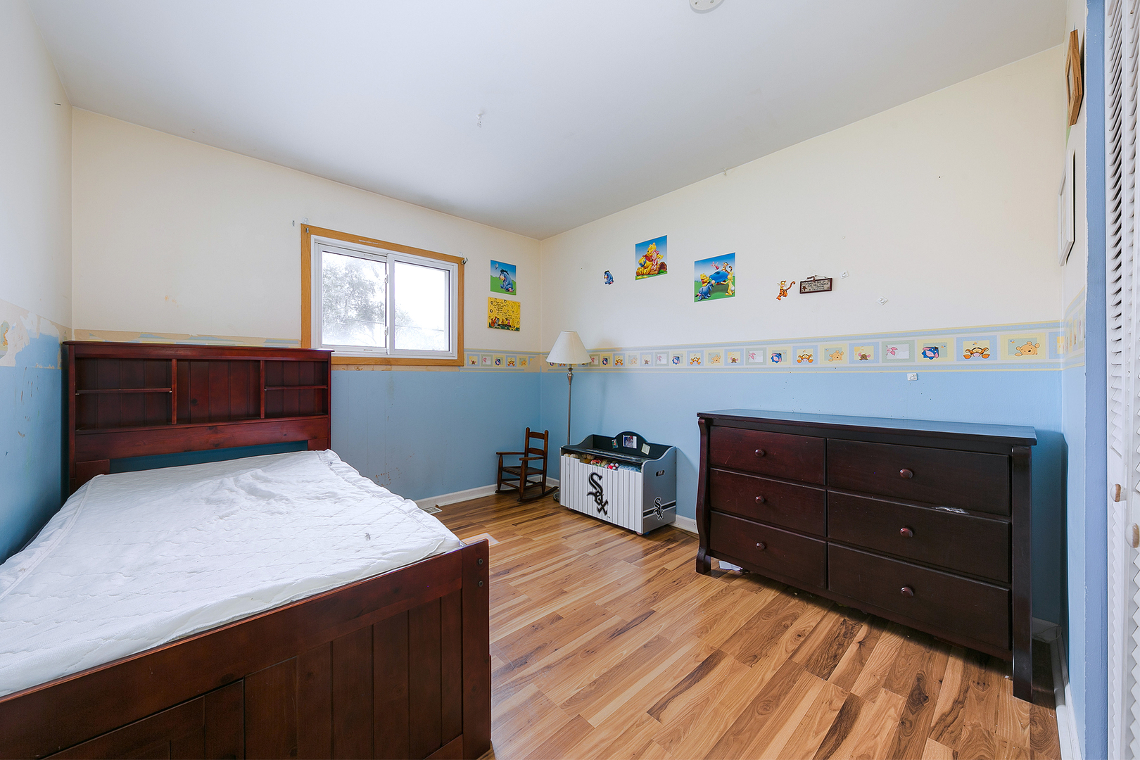 192 South Pinecrest Road Bolingbrook, IL 60440 - Photo 14 of 21 a room with a bed and a dresser