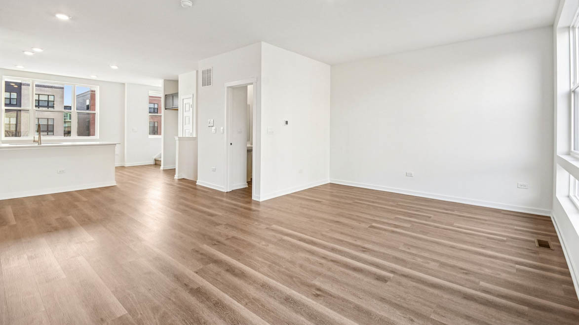 392 Summit Circle Lombard, IL 60148 - Photo 37 of 61 a view of an empty room with wooden floor and a window