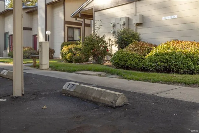 a view of a house with a street