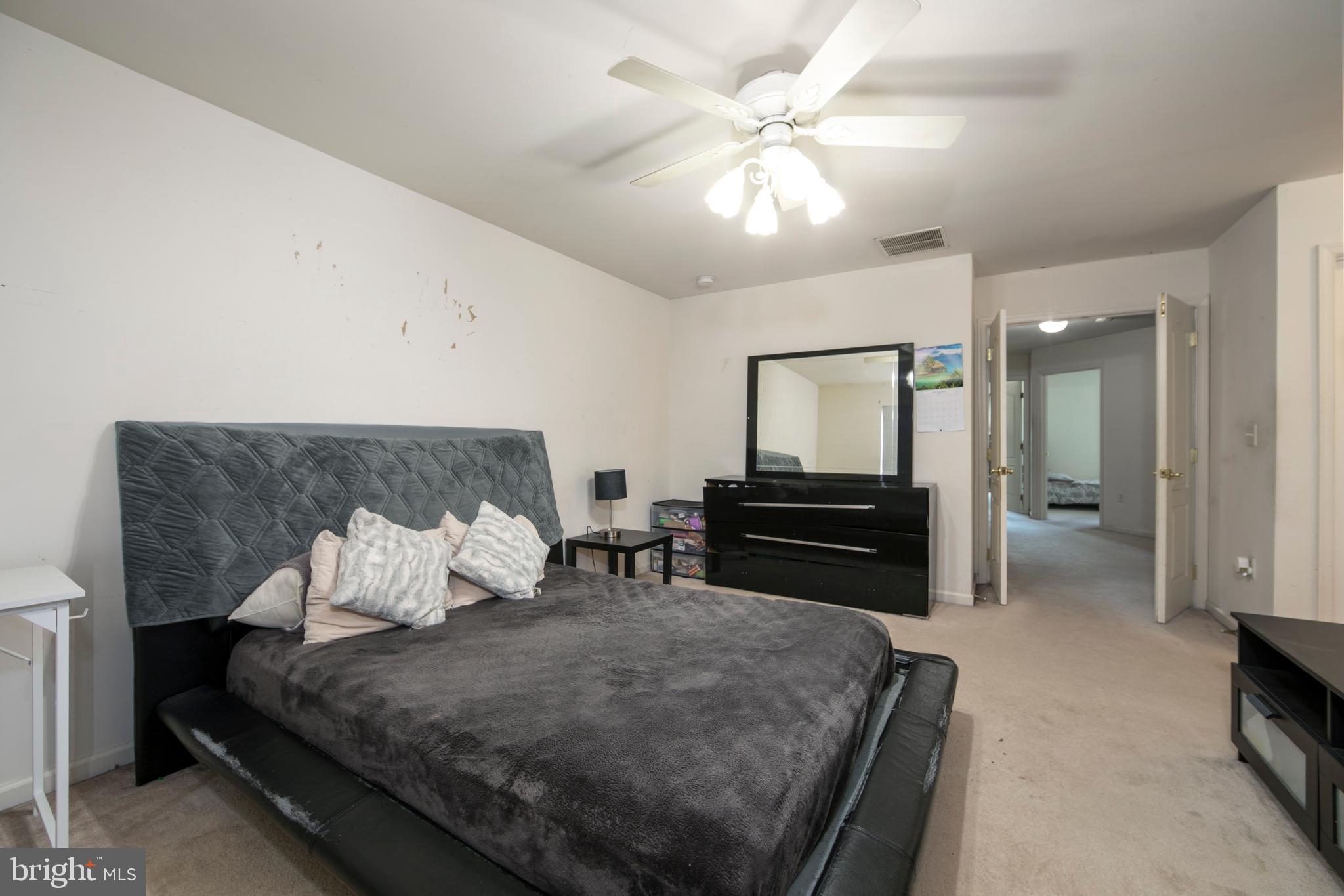 342 Huntington Drive Delran, NJ 08075 - Photo 24 of 45 a bedroom with a bed and dresser