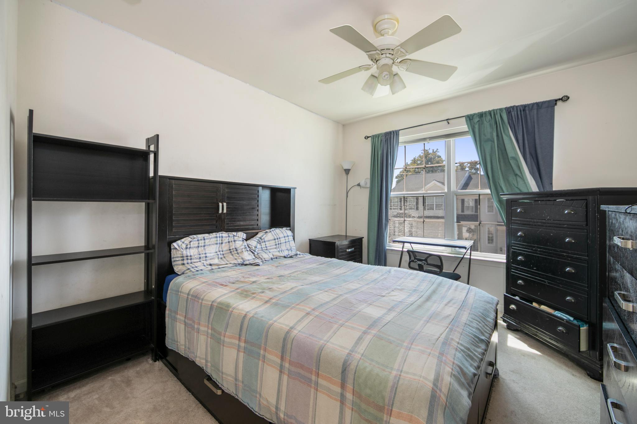 342 Huntington Drive Delran, NJ 08075 - Photo 30 of 45 a bedroom with a bed and a television