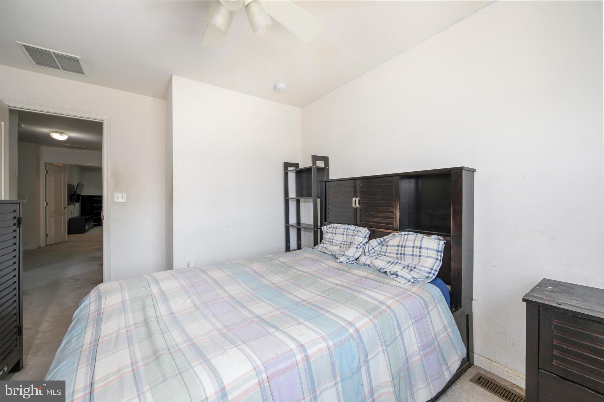 342 Huntington Drive Delran, NJ 08075 - Photo 32 of 45 a bedroom with a bed and a television