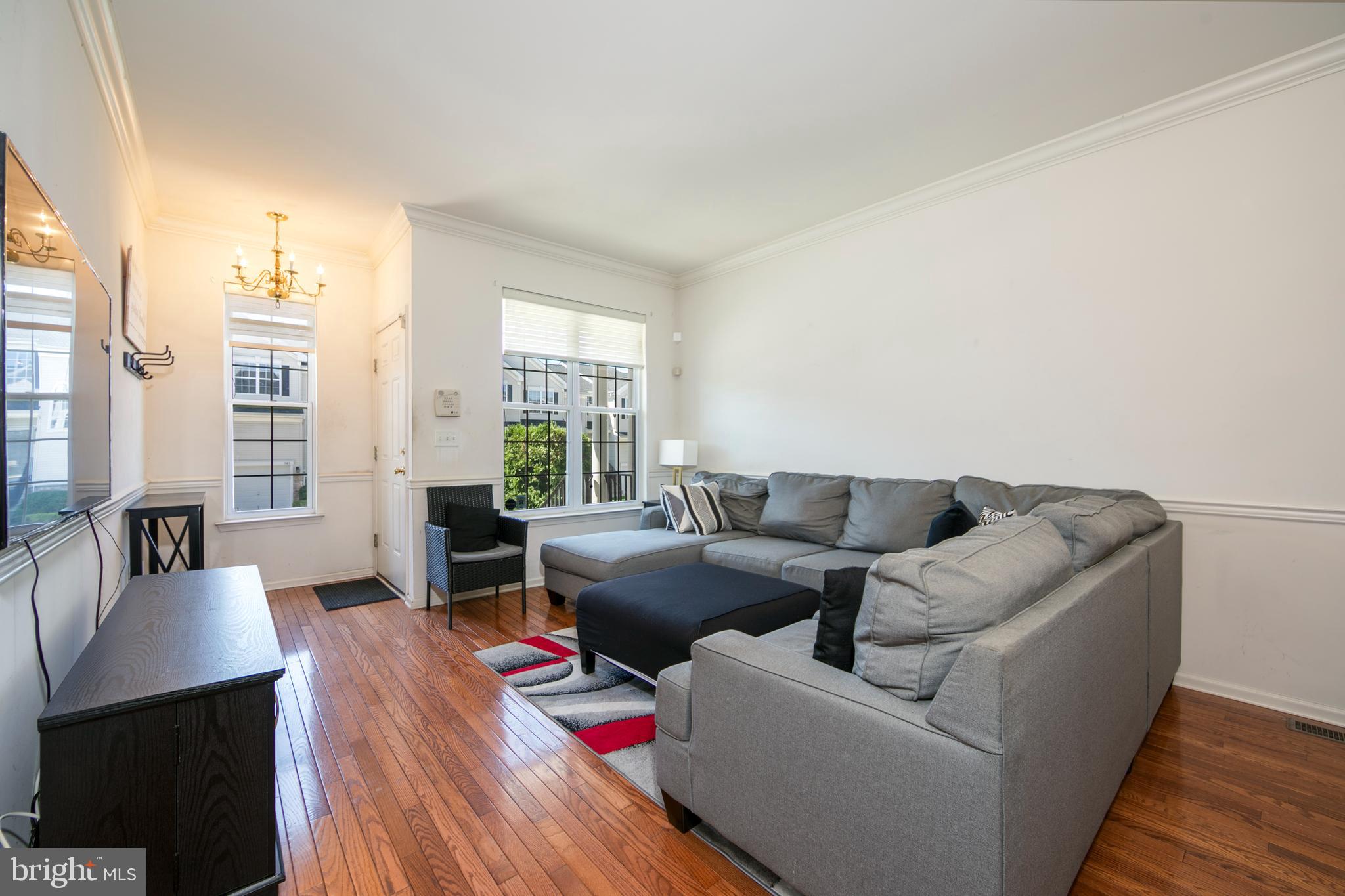 342 Huntington Drive Delran, NJ 08075 - Photo 7 of 45 a living room with furniture and large windows