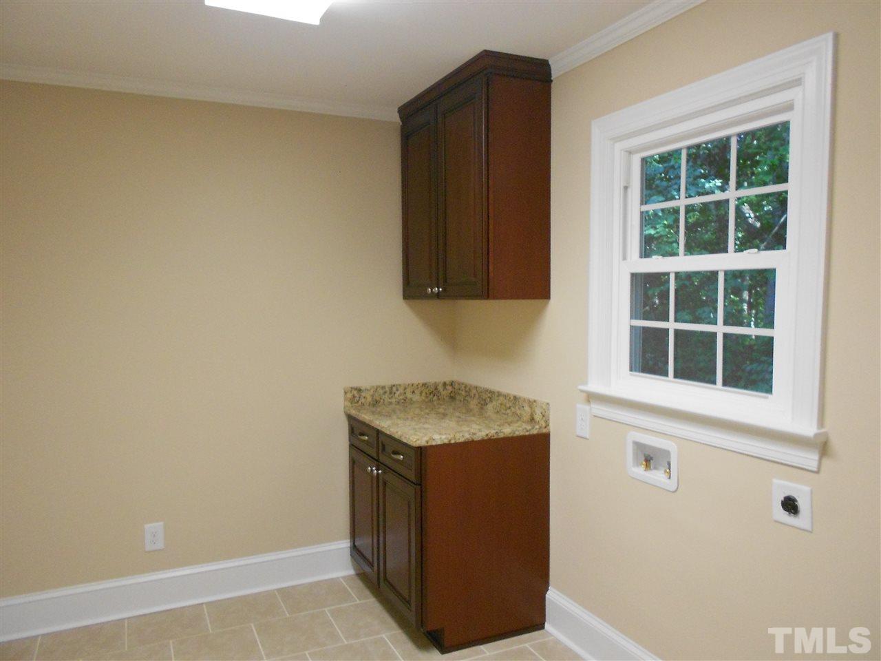 1208 Bancroft Street Raleigh, NC 27612 - Photo 15 of 22 a utility room with washer and dryer