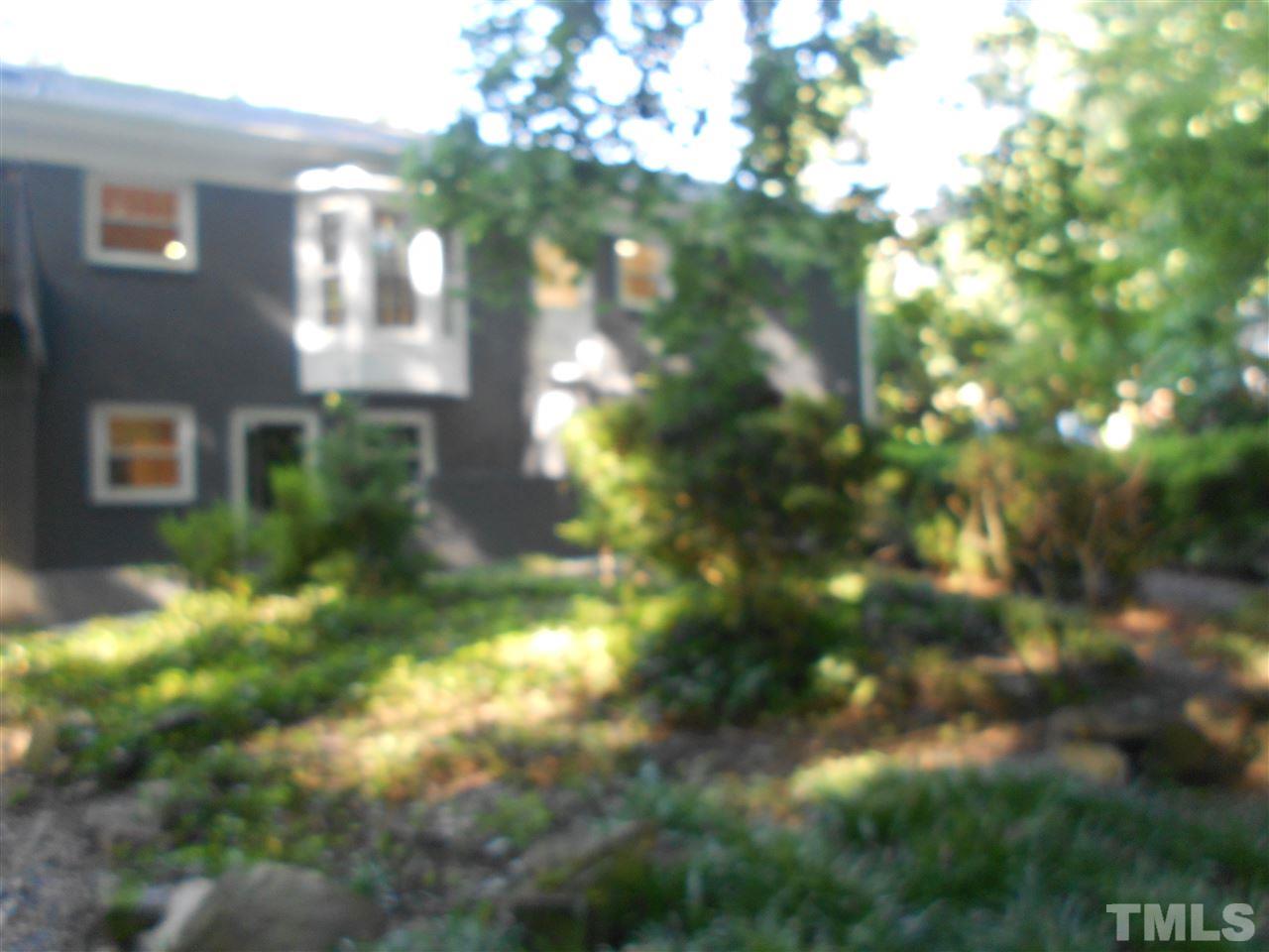 1208 Bancroft Street Raleigh, NC 27612 - Photo 18 of 22 a view of a yard