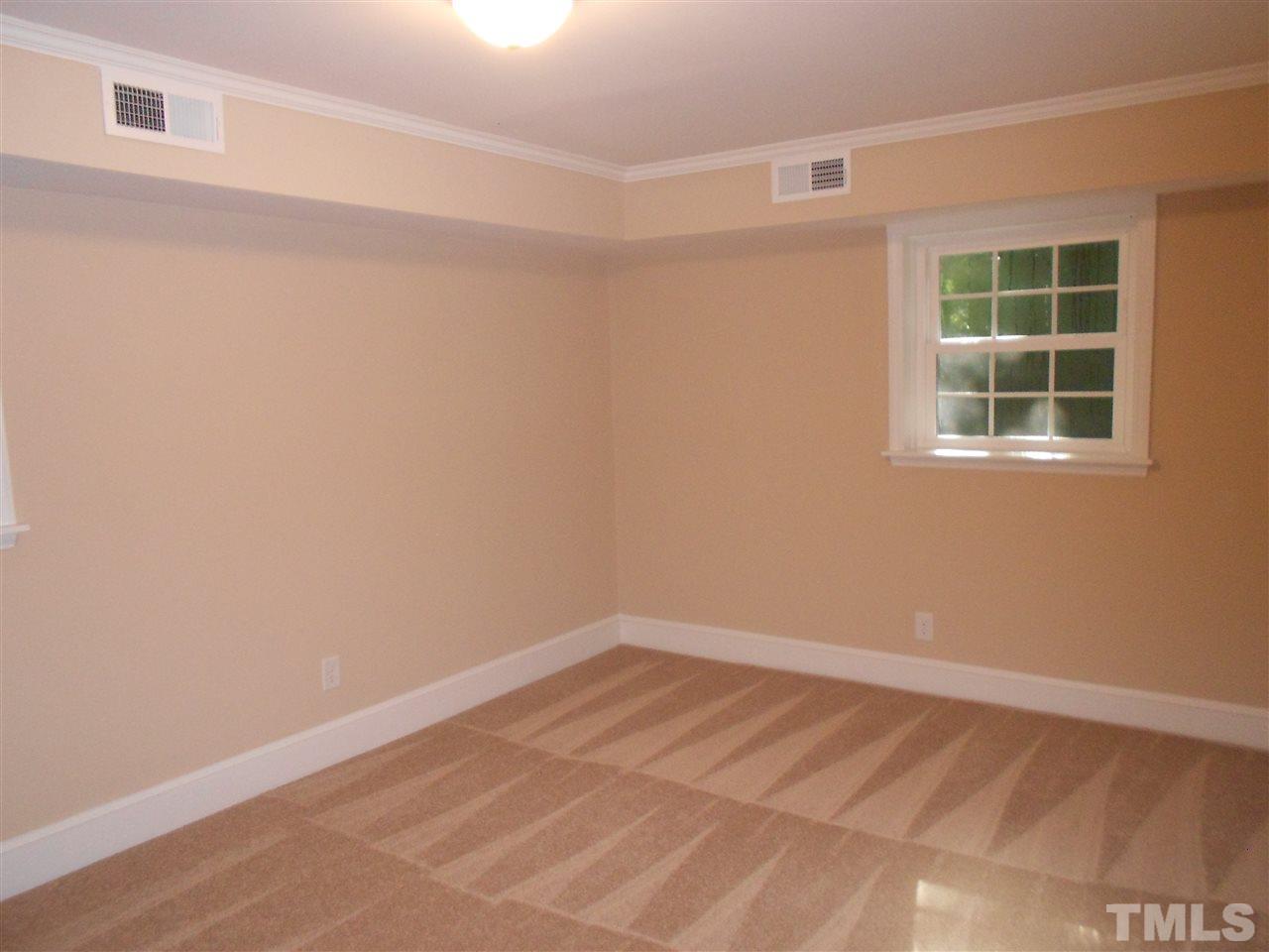 1208 Bancroft Street Raleigh, NC 27612 - Photo 20 of 22 an empty room with a window
