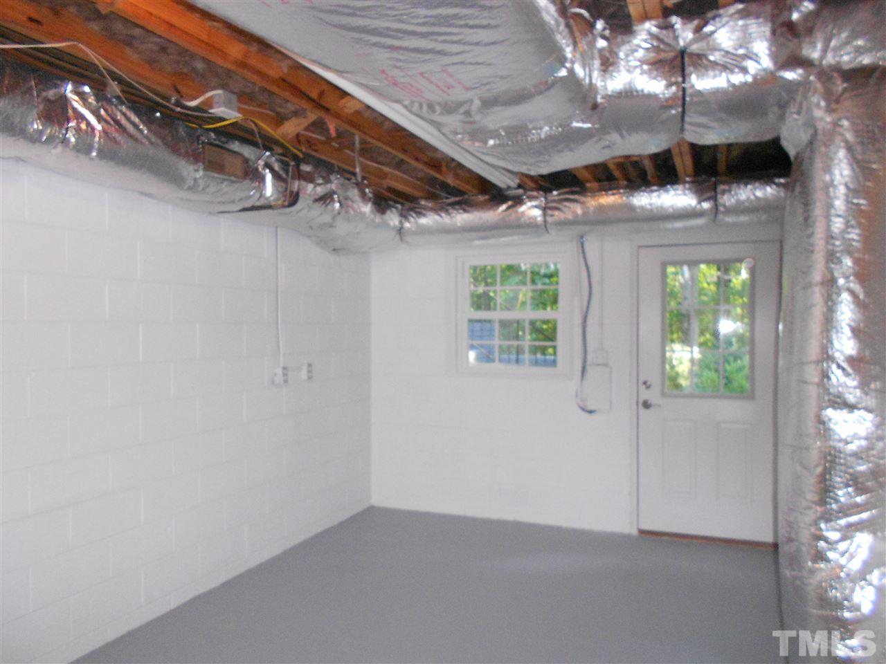 1208 Bancroft Street Raleigh, NC 27612 - Photo 22 of 22 an empty room with windows