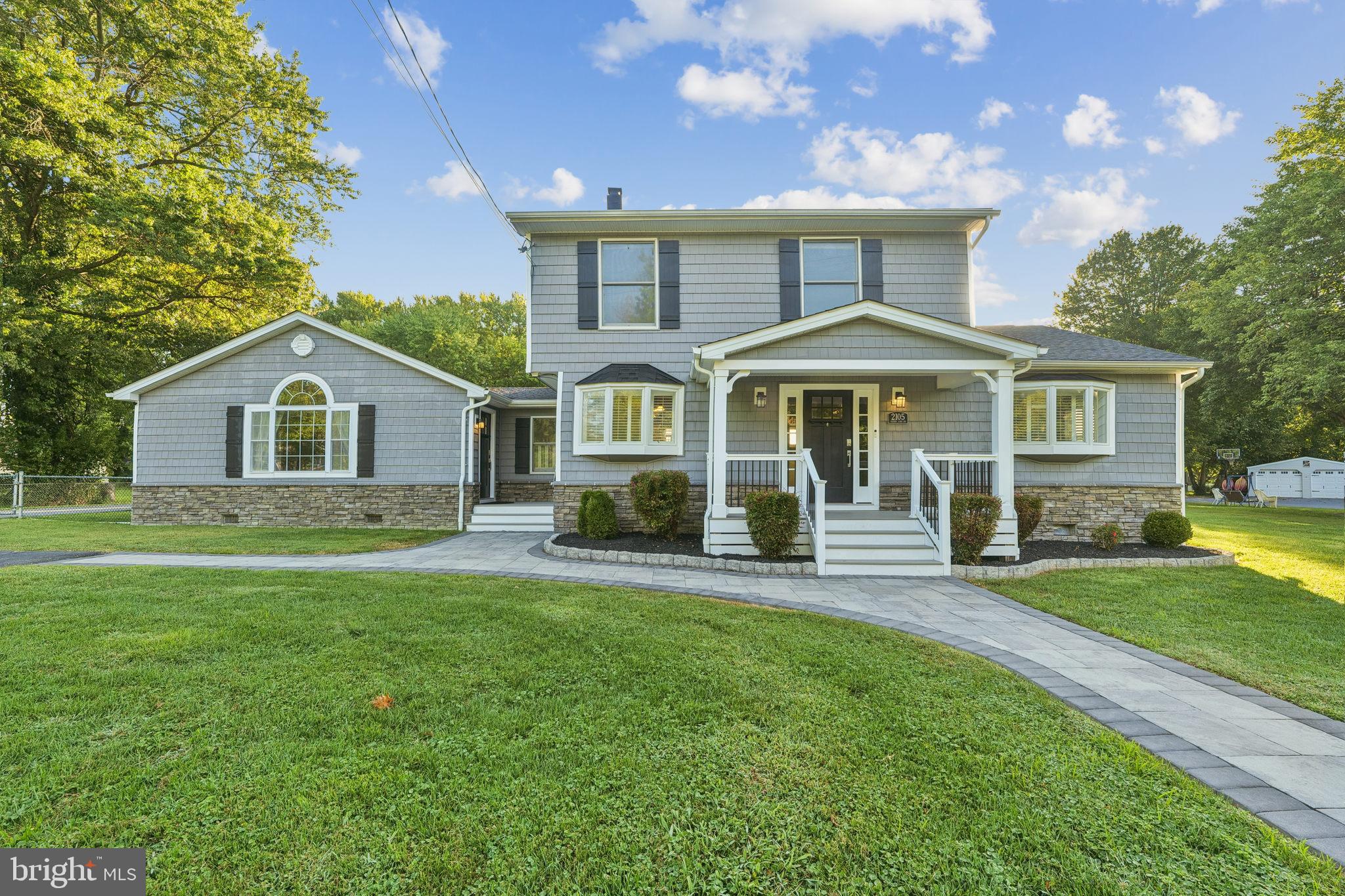 2105 Silver Lane Road Baltimore, MD 21221 - Photo 1 of 55 a front view of a house with a yard