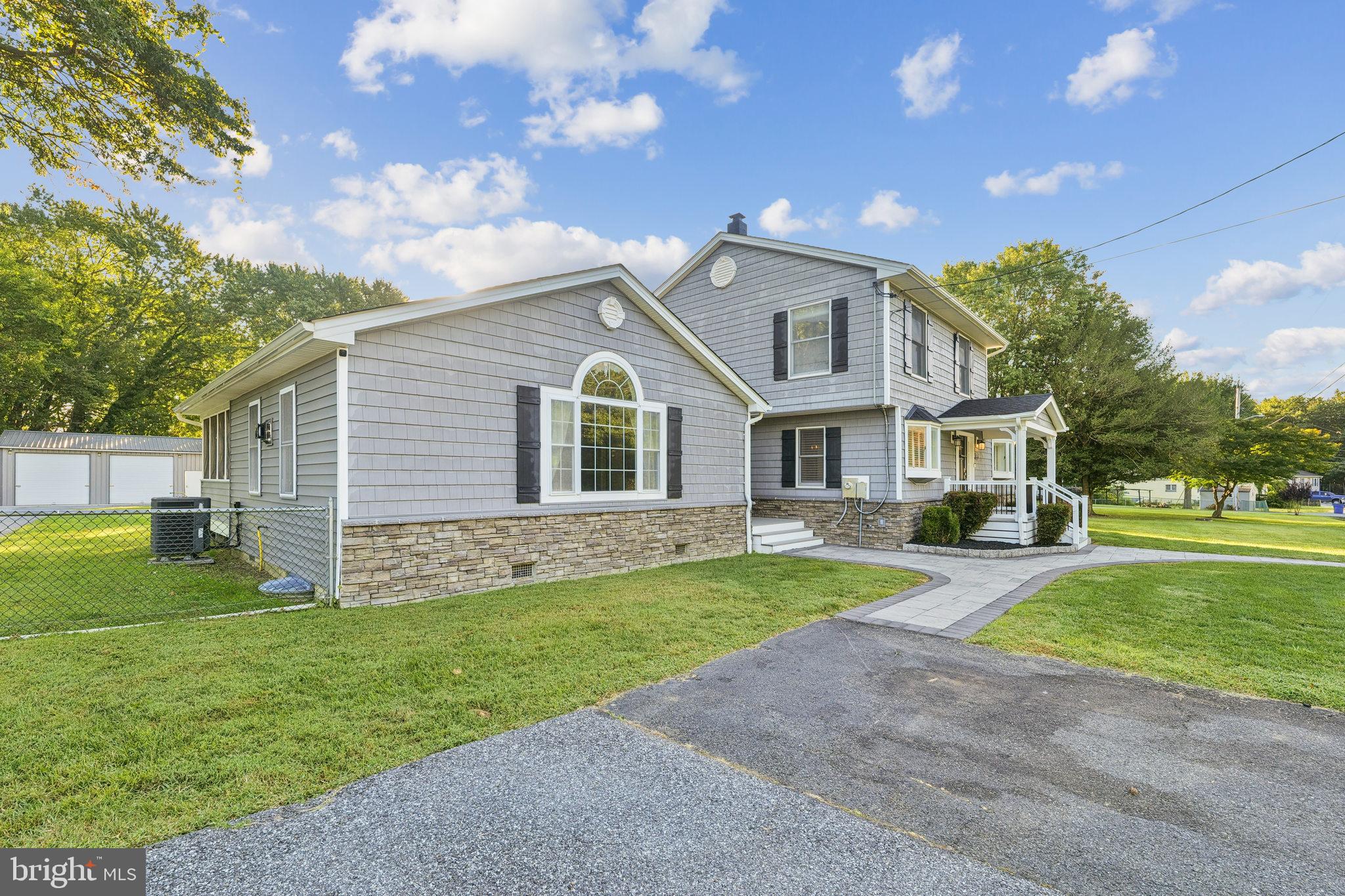 2105 Silver Lane Road Baltimore, MD 21221 - Photo 4 of 55 a front view of a house with a yard