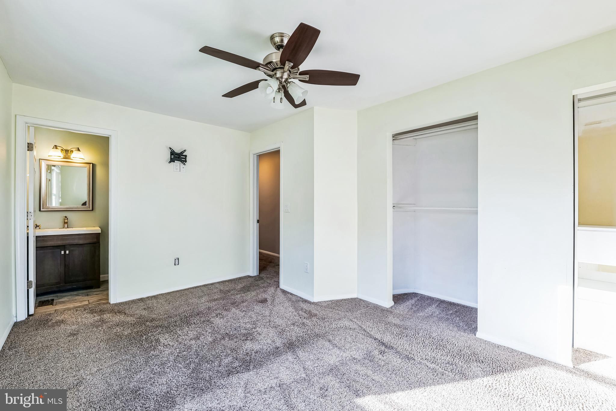 2105 Silver Lane Road Baltimore, MD 21221 - Photo 48 of 55 a view of a livingroom with a ceiling fan