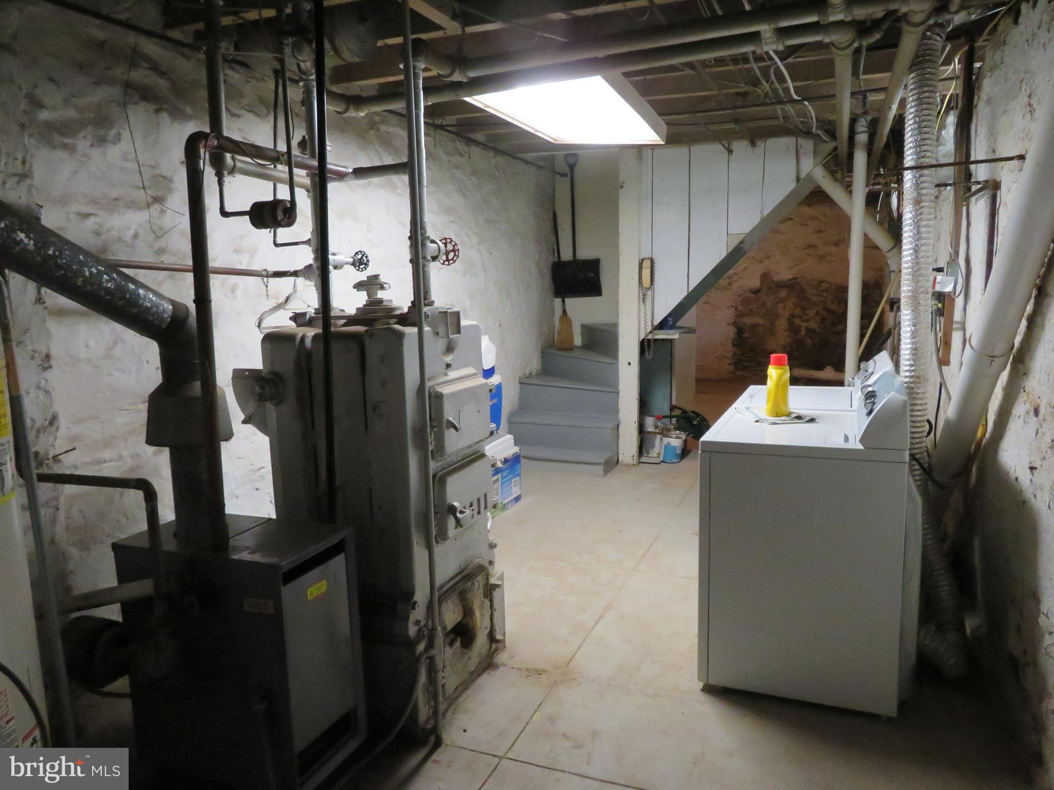 355 Church Road Elkins Park, PA 19027 - Photo 24 of 29 Basement with laundry.