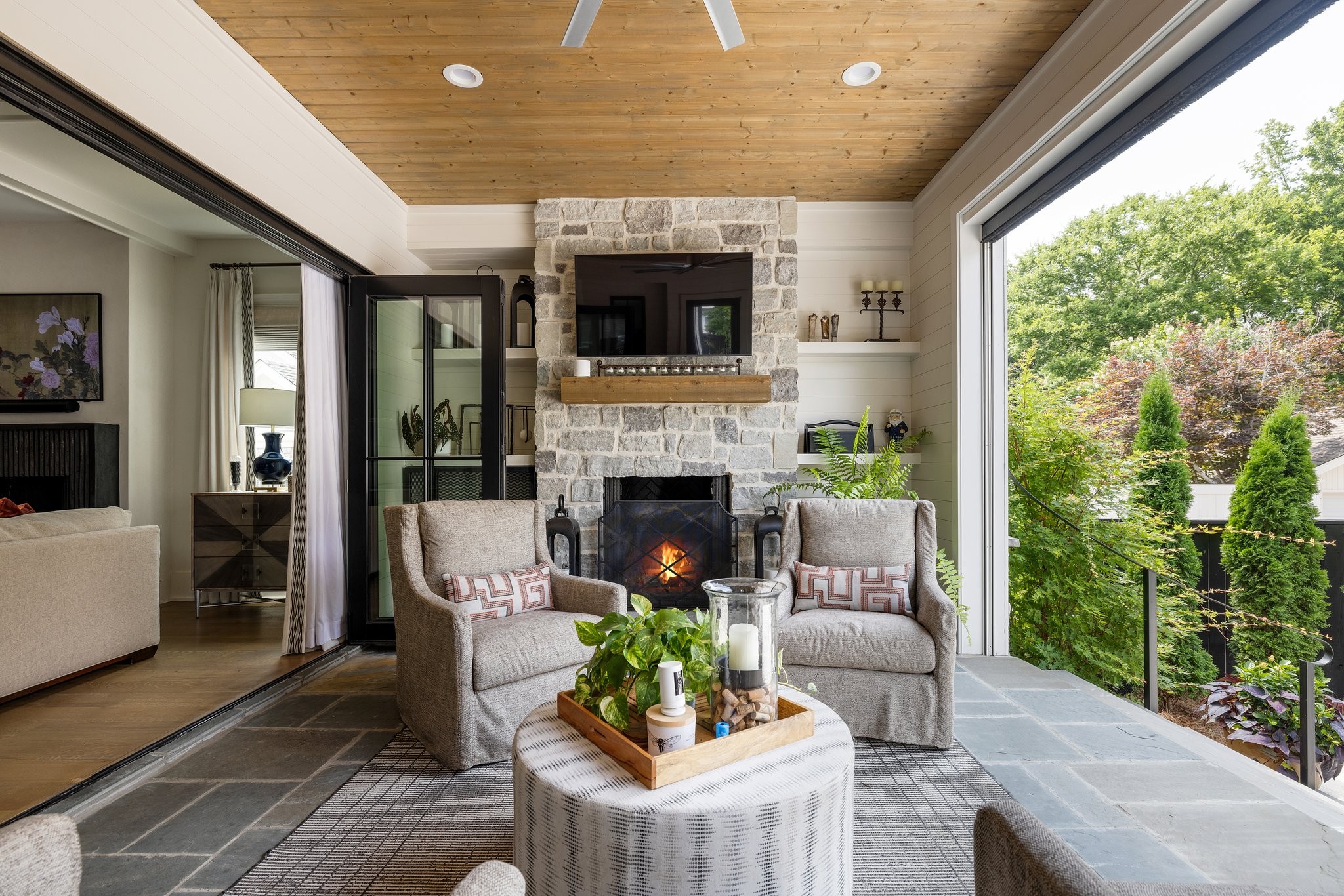 280 Harding Place Nashville, TN 37205 - Photo 63 of 79 a living room with furniture a fireplace and a flat screen tv