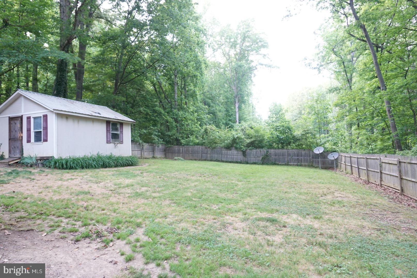 10505 Brock Road Spotsylvania, VA 22553 - Photo 14 of 14 Fenced in backyard with shed