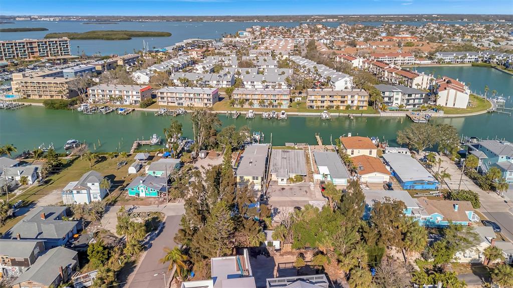 109 125th Avenue Treasure Island, FL 33706 - Photo 17 of 46 an aerial view of a houses with outdoor space