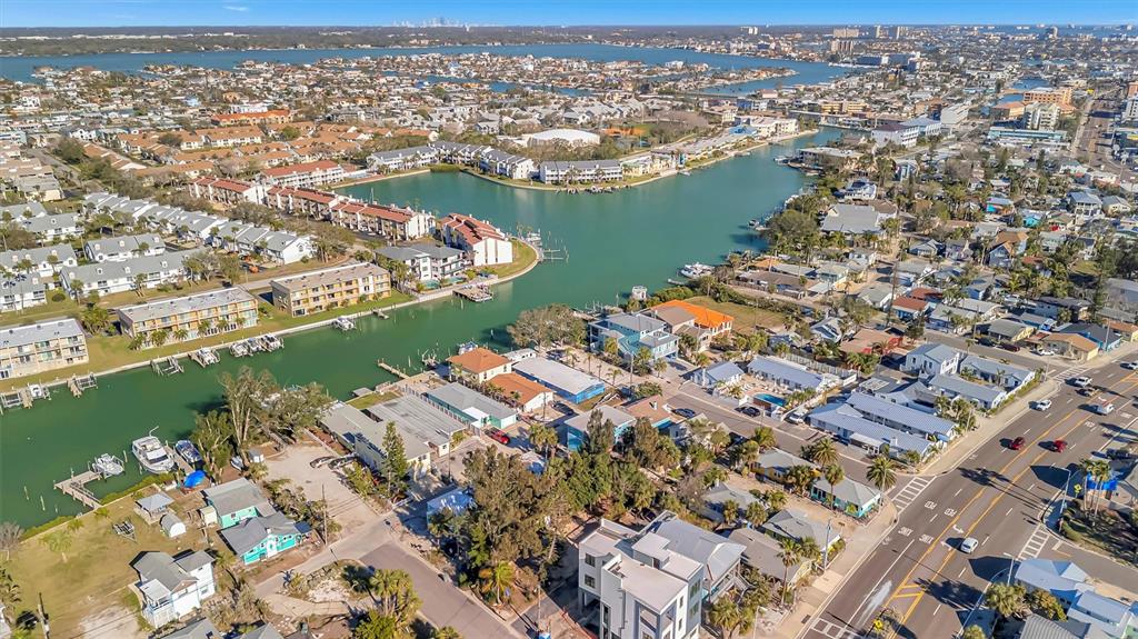 109 125th Avenue Treasure Island, FL 33706 - Photo 30 of 46 an aerial view of ocean and residential houses with outdoor space