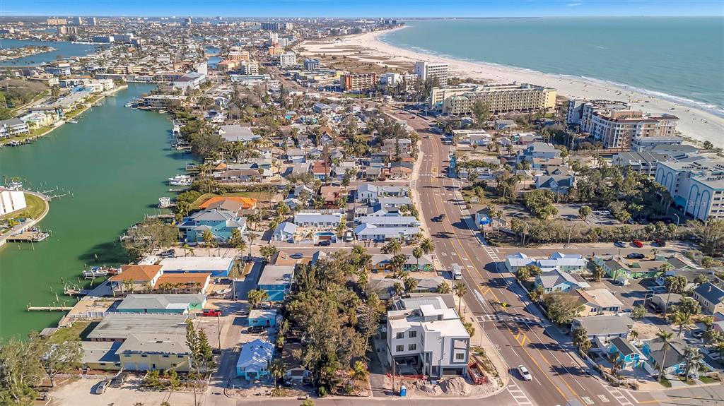 109 125th Avenue Treasure Island, FL 33706 - Photo 31 of 46 an aerial view of a city with ocean view