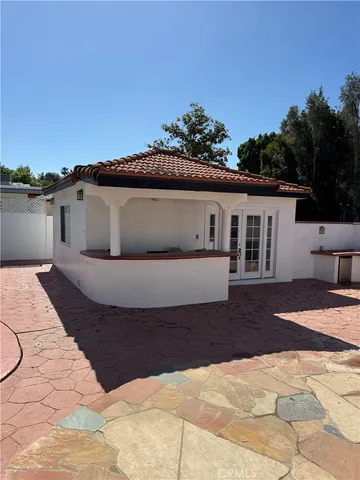 a view of swimming pool with a yard and seating area
