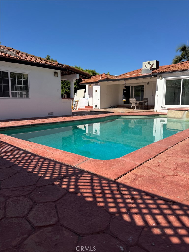 5230 Seville Avenue Encino, CA 91316 - Photo 32 of 61 a view of a house with a yard